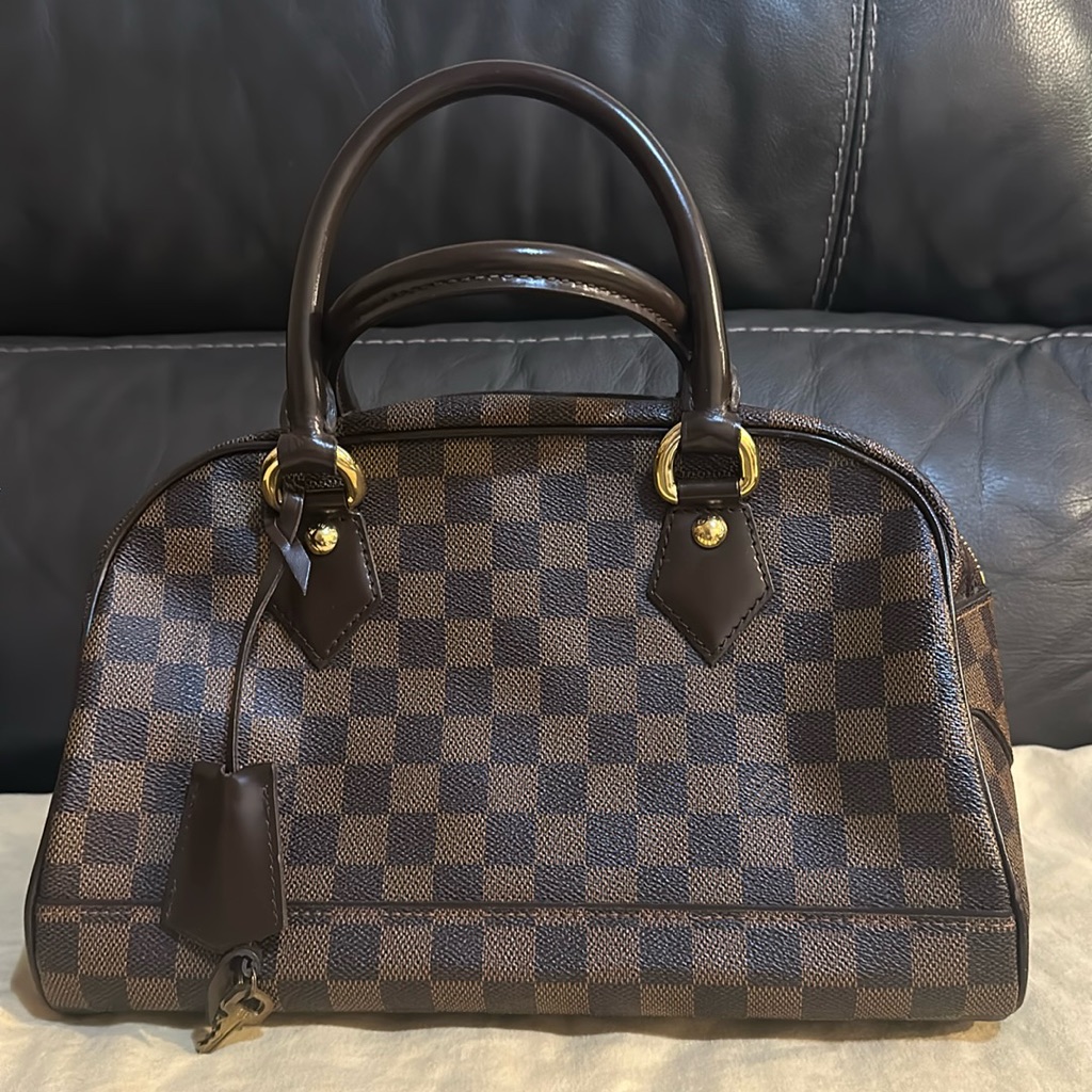 Authentic L.V